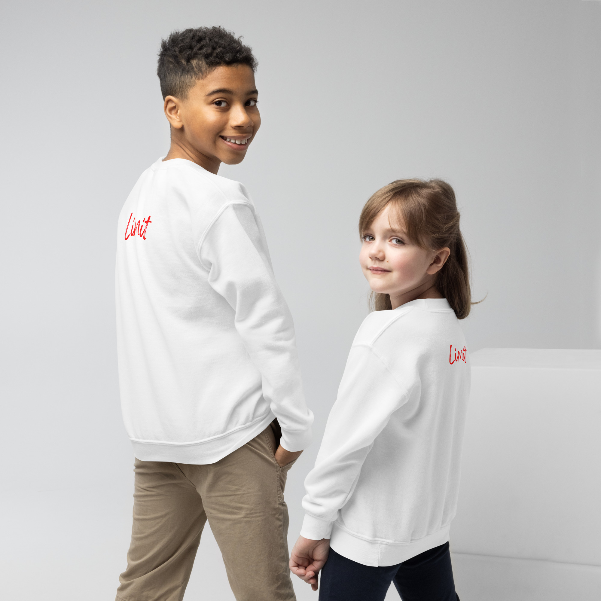 youth-crew-neck-sweatshirt-white-back-65397eeda2128.jpg